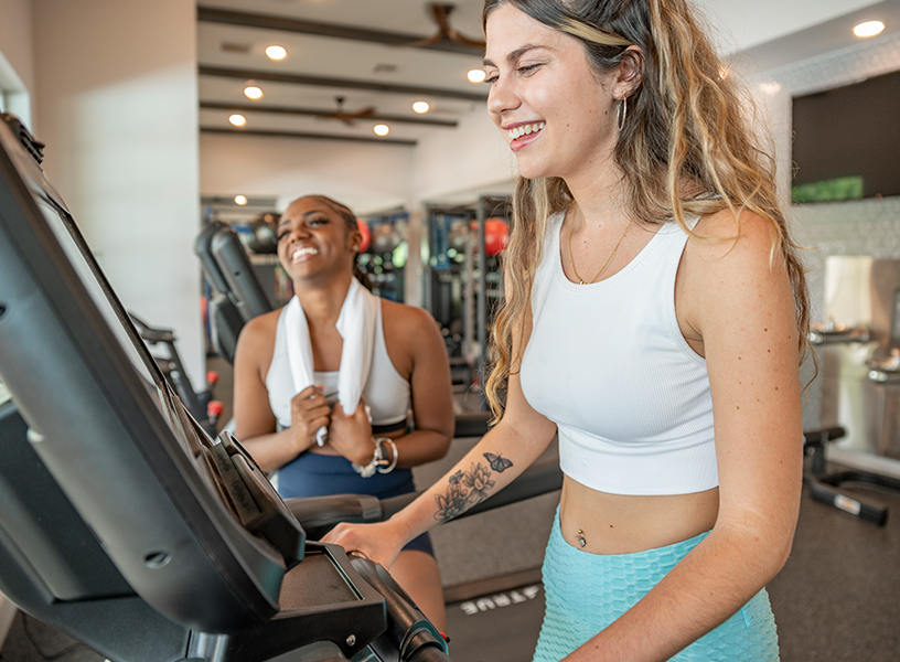 Young adult running on a treadmill